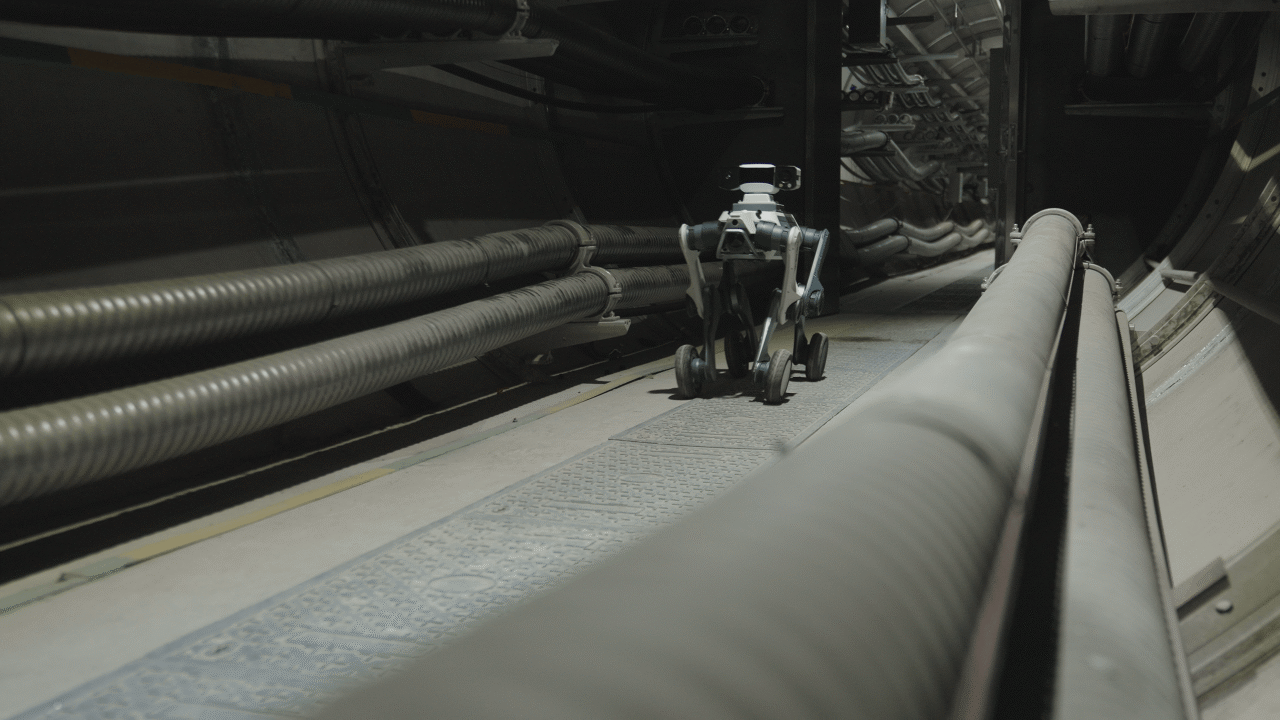 DEEP Robotics Lynx M20 Pro quadruped robot equipped with an HD inspection camera performing intelligent power station inspection and maintenance tasks.