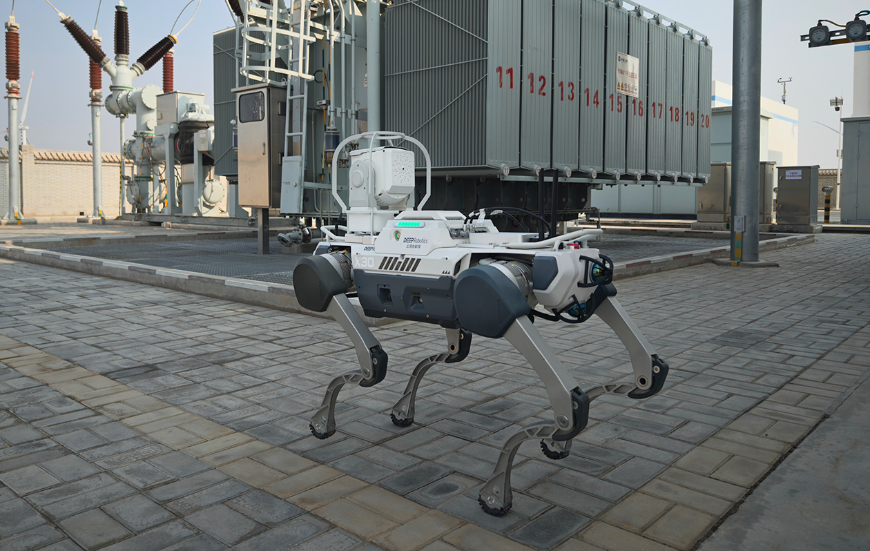 DEEP Robotics X30 Pro quadruped robot performing autonomous inspection tasks at a power station for intelligent maintenance and monitoring.
