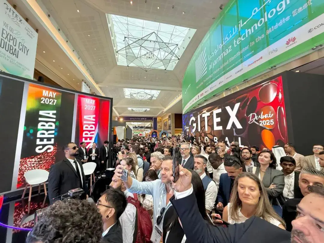 Large crowd attending GITEX GLOBAL 2025 exhibition, showcasing cutting-edge technology innovations, robotics, and AI advancements.